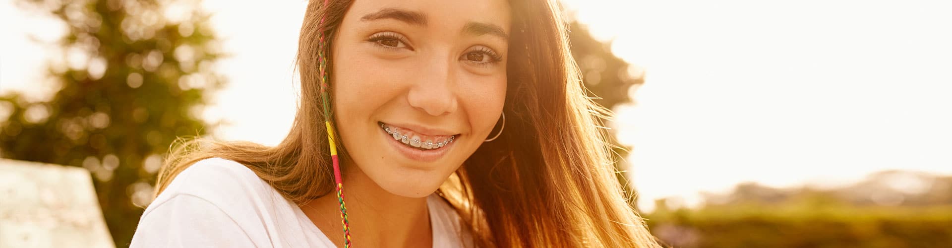 Teen Girl Braces Slider at Optimal Orthodontics of Humble in Humble TX