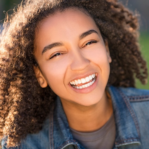 Teen smiling at Optimal Orthodontics of Humble in Humble, TX